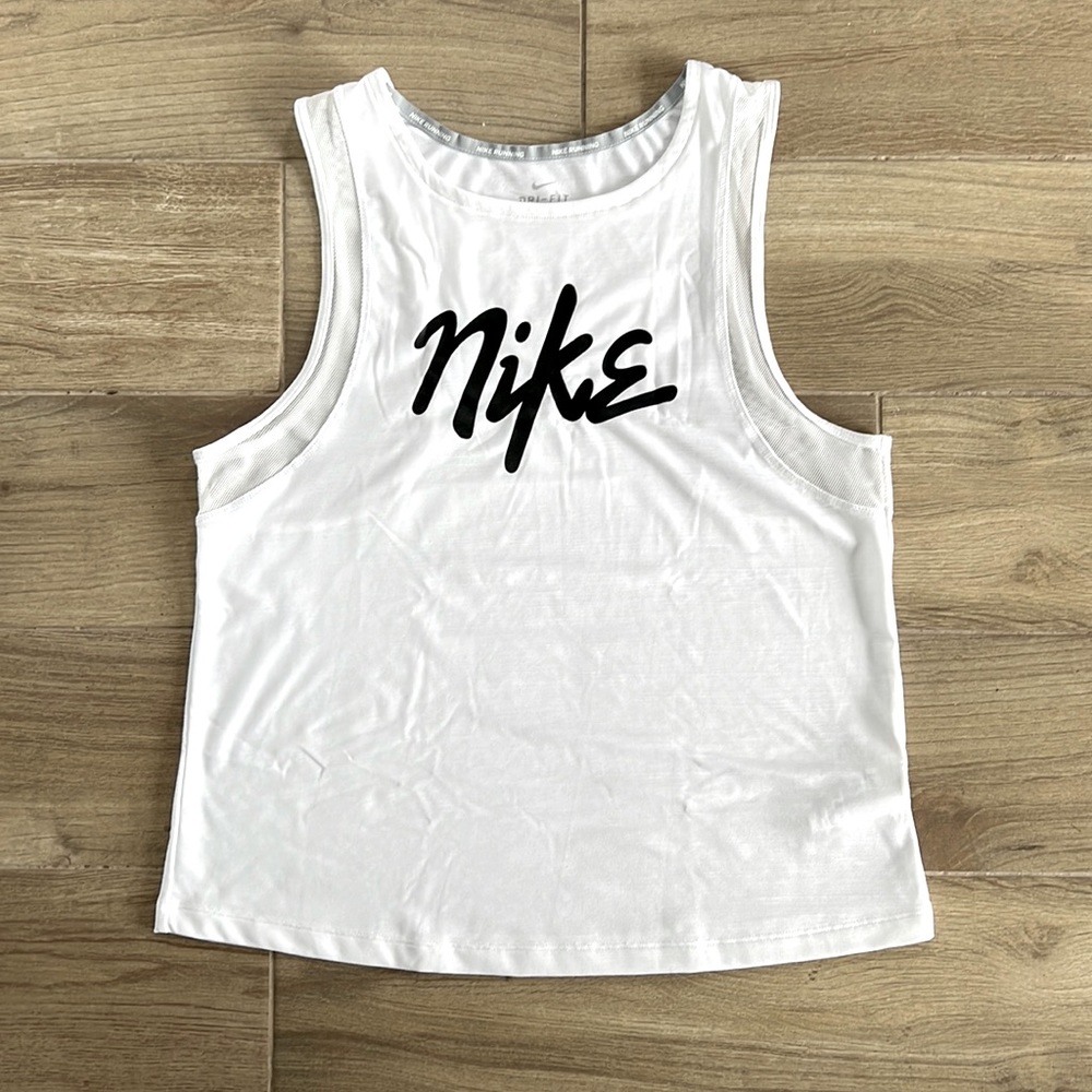 Nike Running Dri-Fit Top. Size Large. Excellent condition. Worn only once.